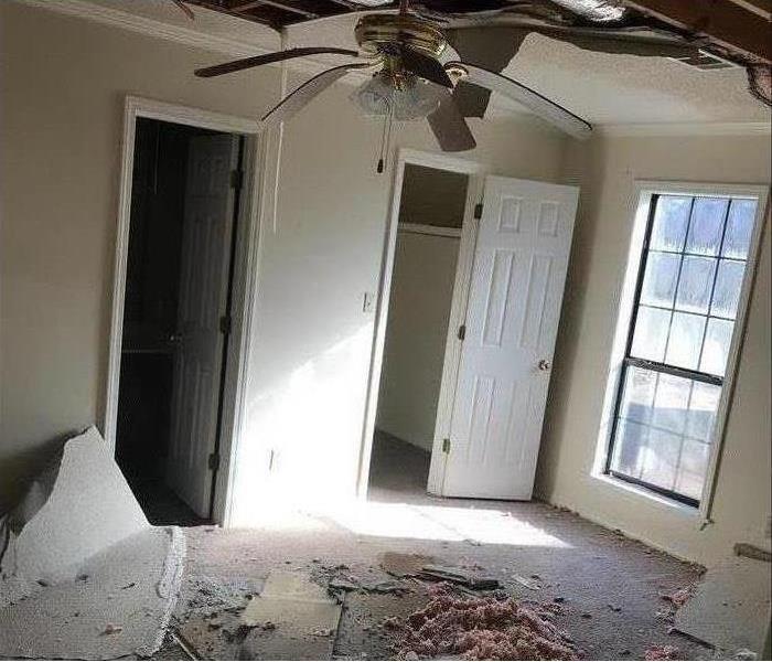 room with ceiling fallen in 